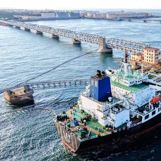 China Oil Cut Eases Crisis